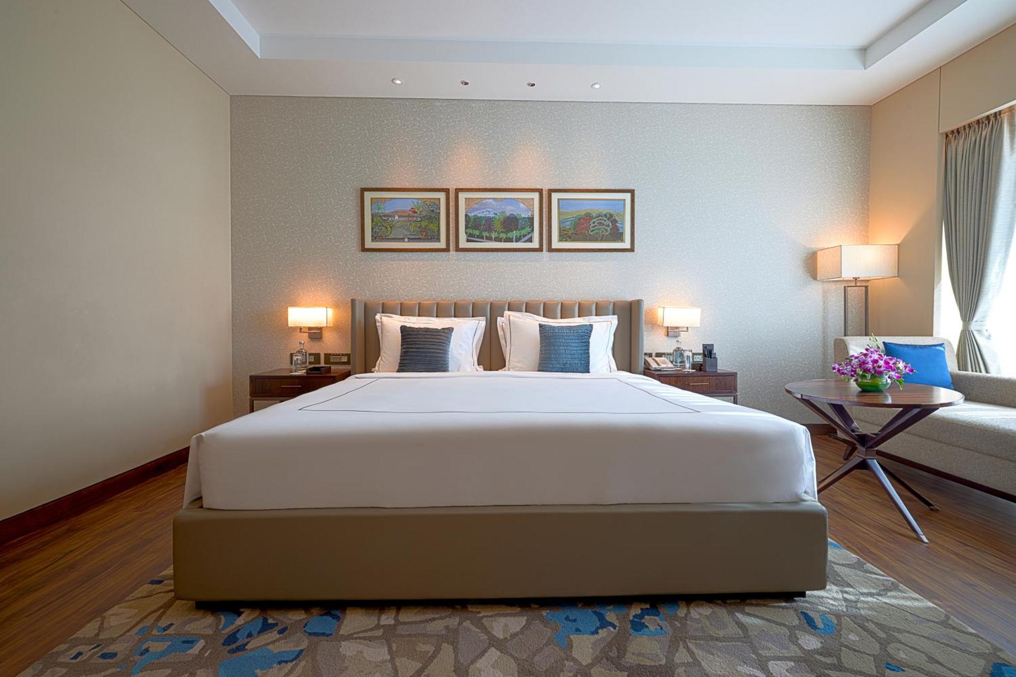 Taj Bangalore Devanahalli Εξωτερικό φωτογραφία A bedroom at the Taj Bengal