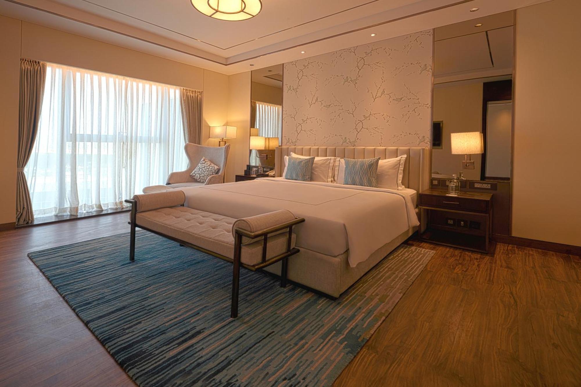 Taj Bangalore Devanahalli Εξωτερικό φωτογραφία A bedroom at the hotel