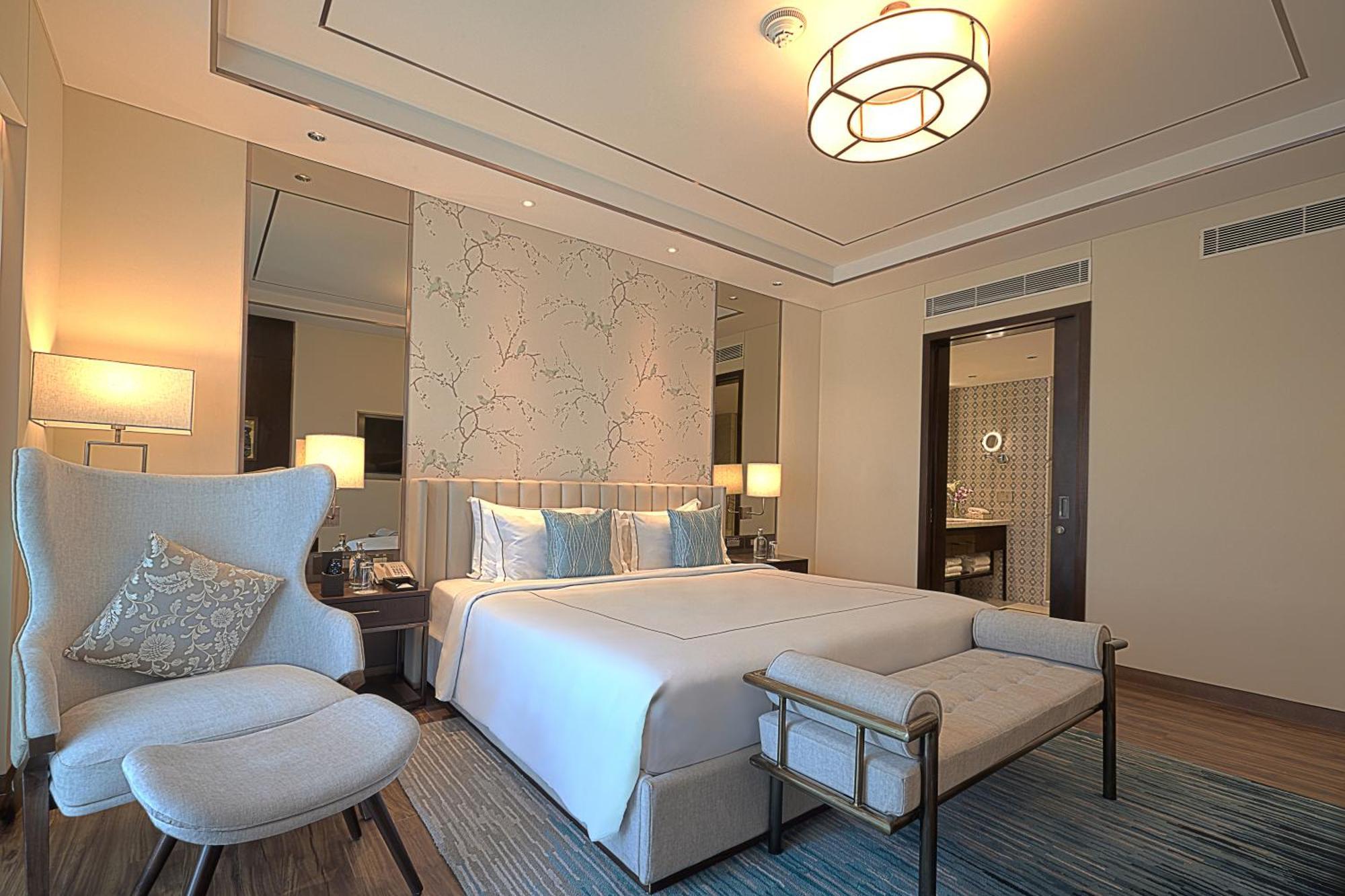 Taj Bangalore Devanahalli Εξωτερικό φωτογραφία A bedroom at the hotel