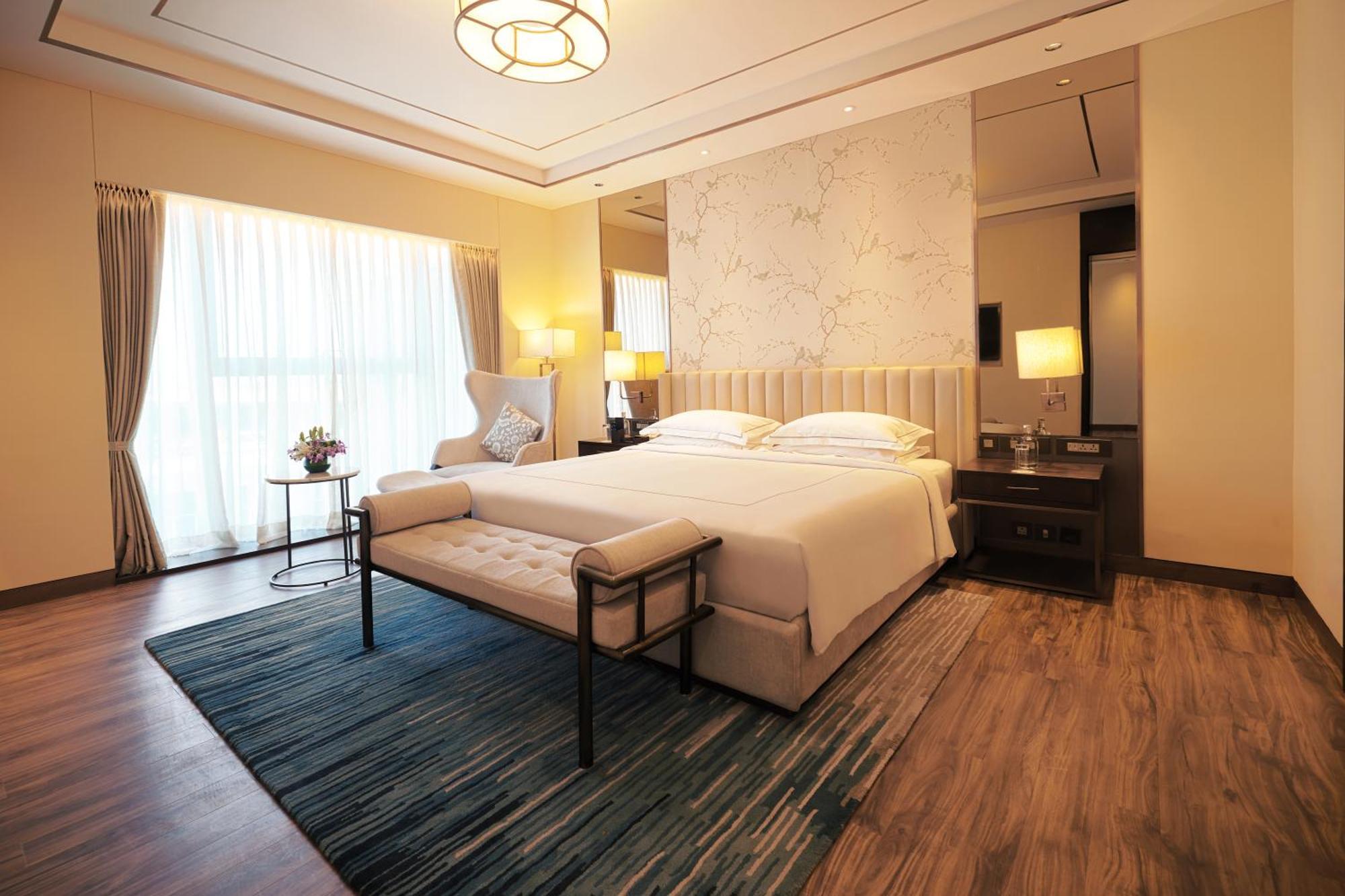 Taj Bangalore Devanahalli Εξωτερικό φωτογραφία A bedroom at the hotel